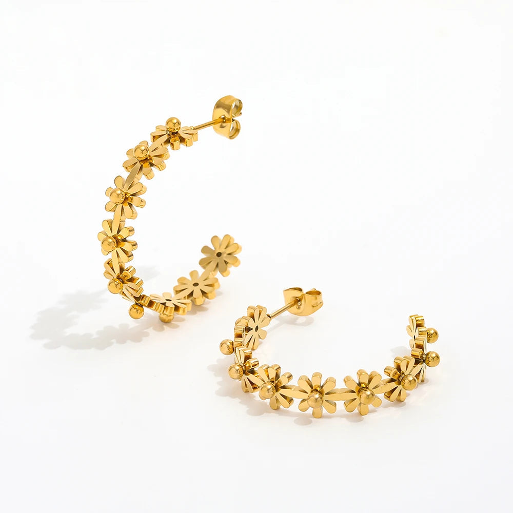 Gold daisy creole earring